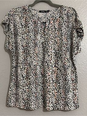 Cure. Women's Leopard Print Keyhole Blouse in White and Black with Pink Accents